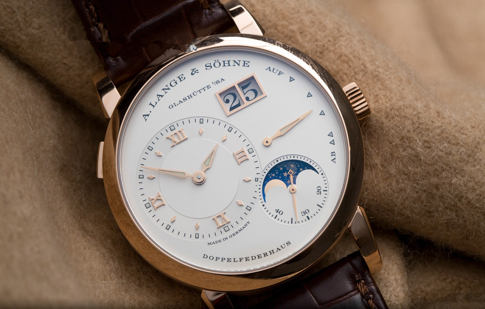 The white dials fake watches have moon phases.
